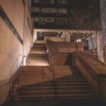 A staircase leading up to a large building