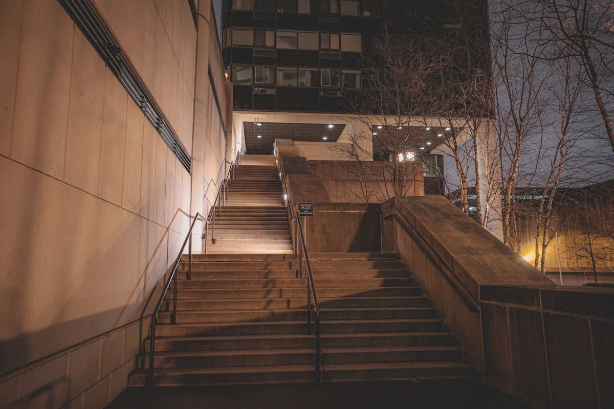 A staircase leading up to a large building