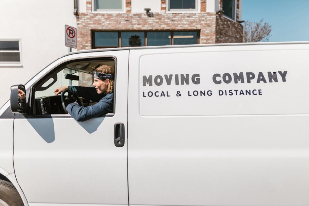 A man in a moving company truck