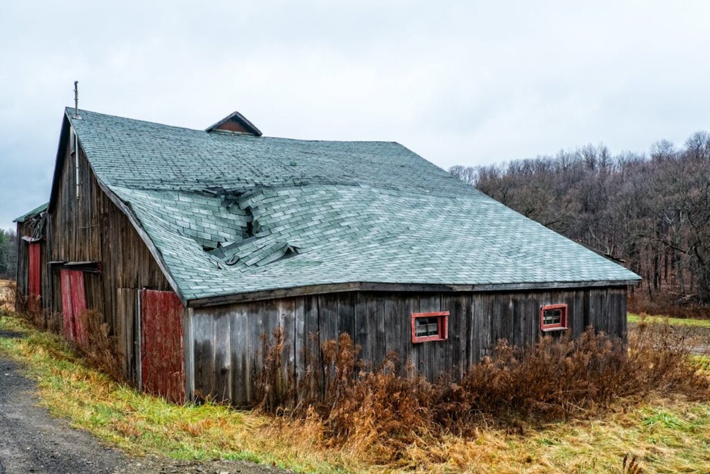 A barn with the roof caved in