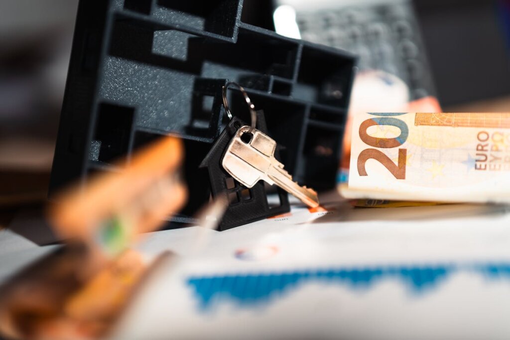 A key hanging in a plastic piece