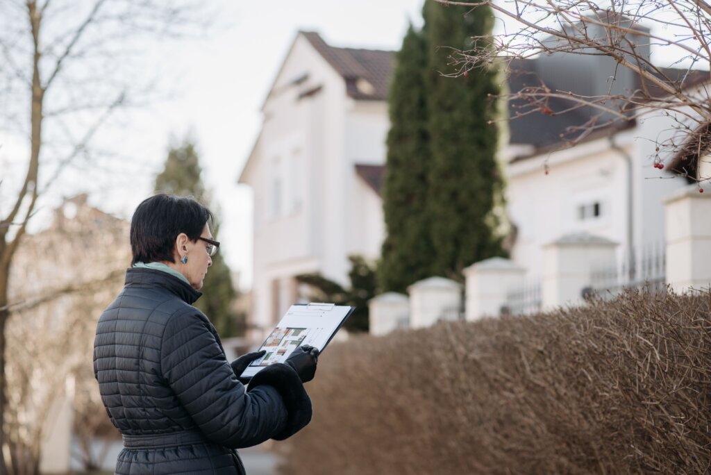 woman inspecting a home