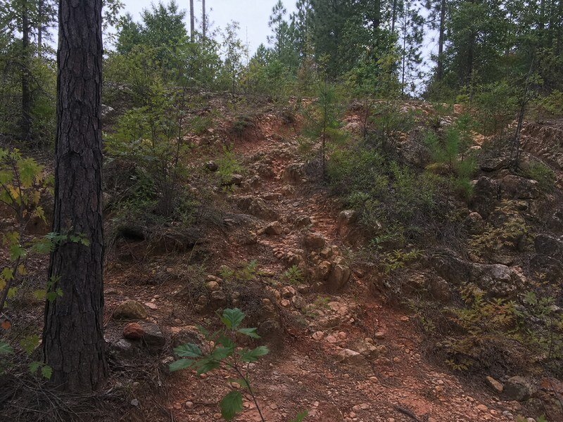 Rough uneven rural terrain indicating difficult land use.