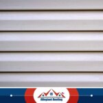 A close up of a white siding.