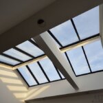 A room with an installed skylight.