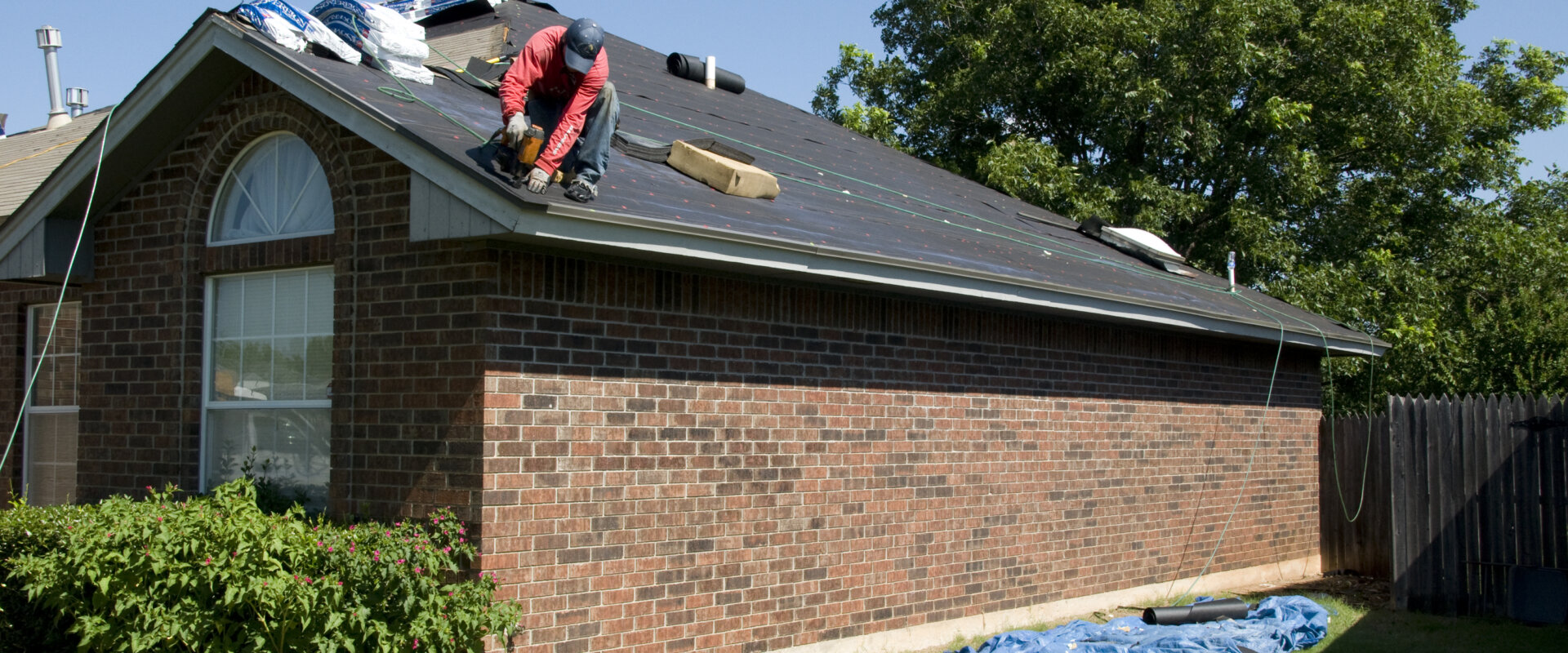 A local roofing contractor is working on a roof.