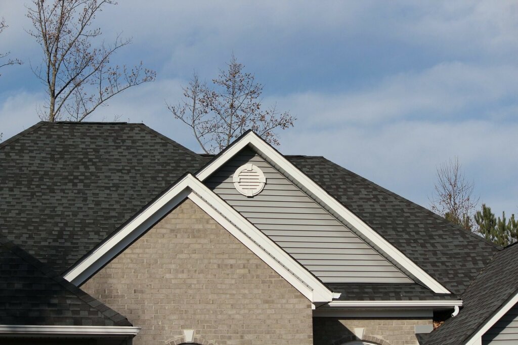 house with shingle roofing