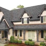 An older home with a large front porch.