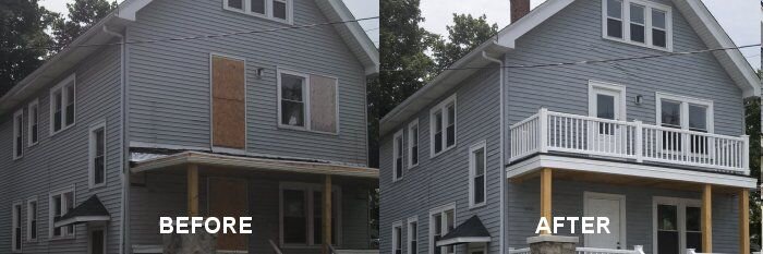 Fire damaged Buffalo NY house with boarded gable and structural damage before cash sale to Nickel City Buyers