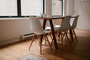office table with white chair and wooden floors. Selling Rental Property in South Tampa,FL
