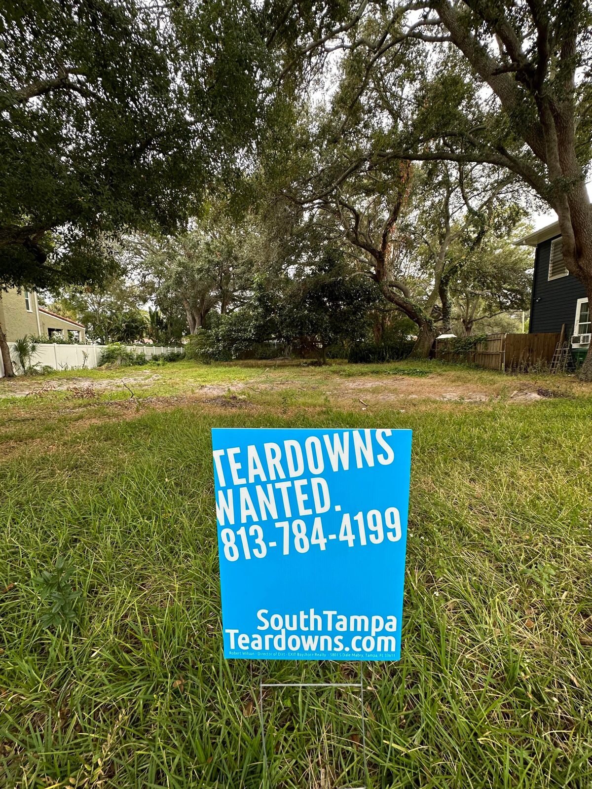 Grassy South Tampa lot with a Teardowns Wanted sign