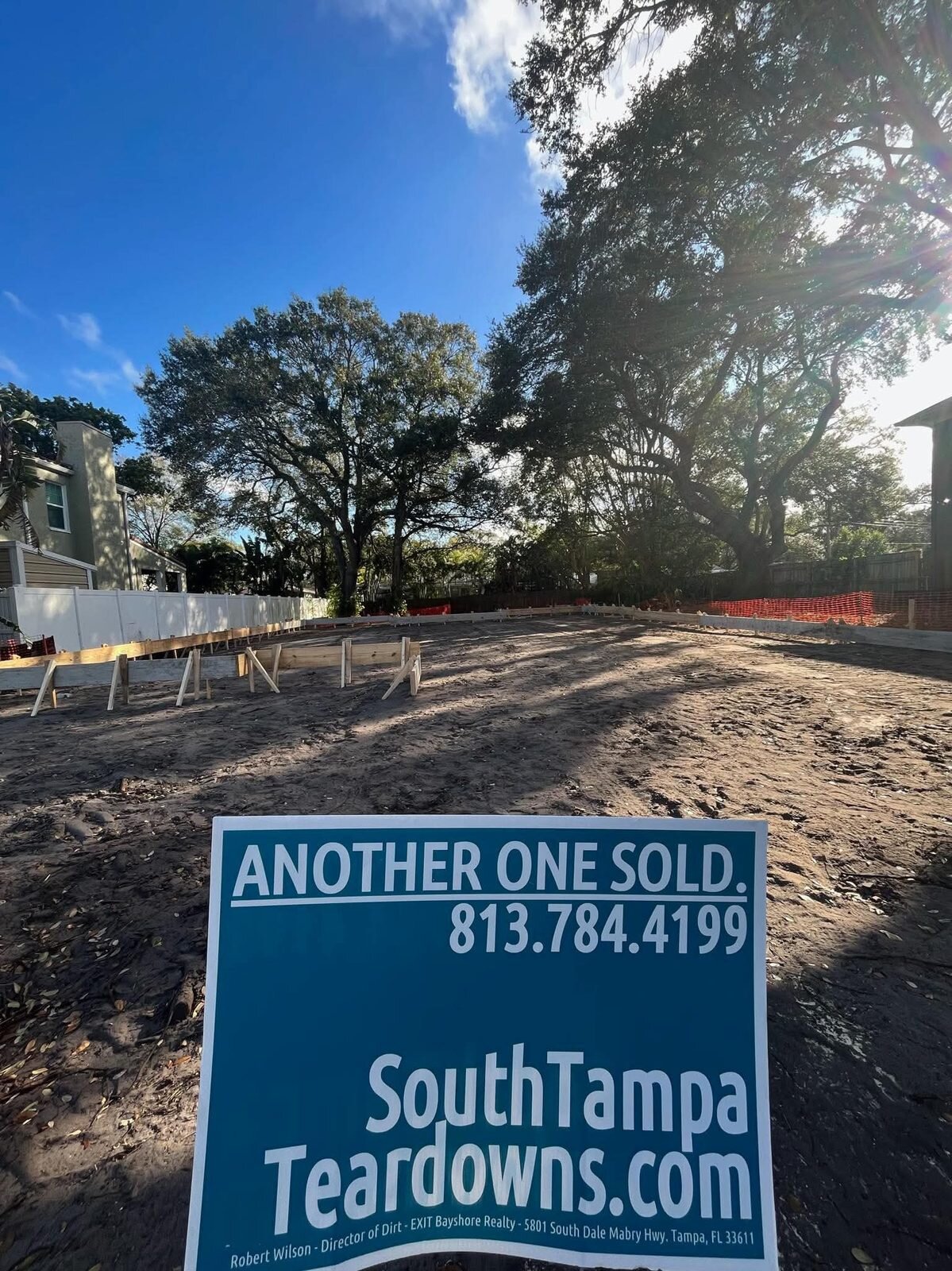 Another One Sold sign on a cleared South Tampa lot with the new foundation forms set