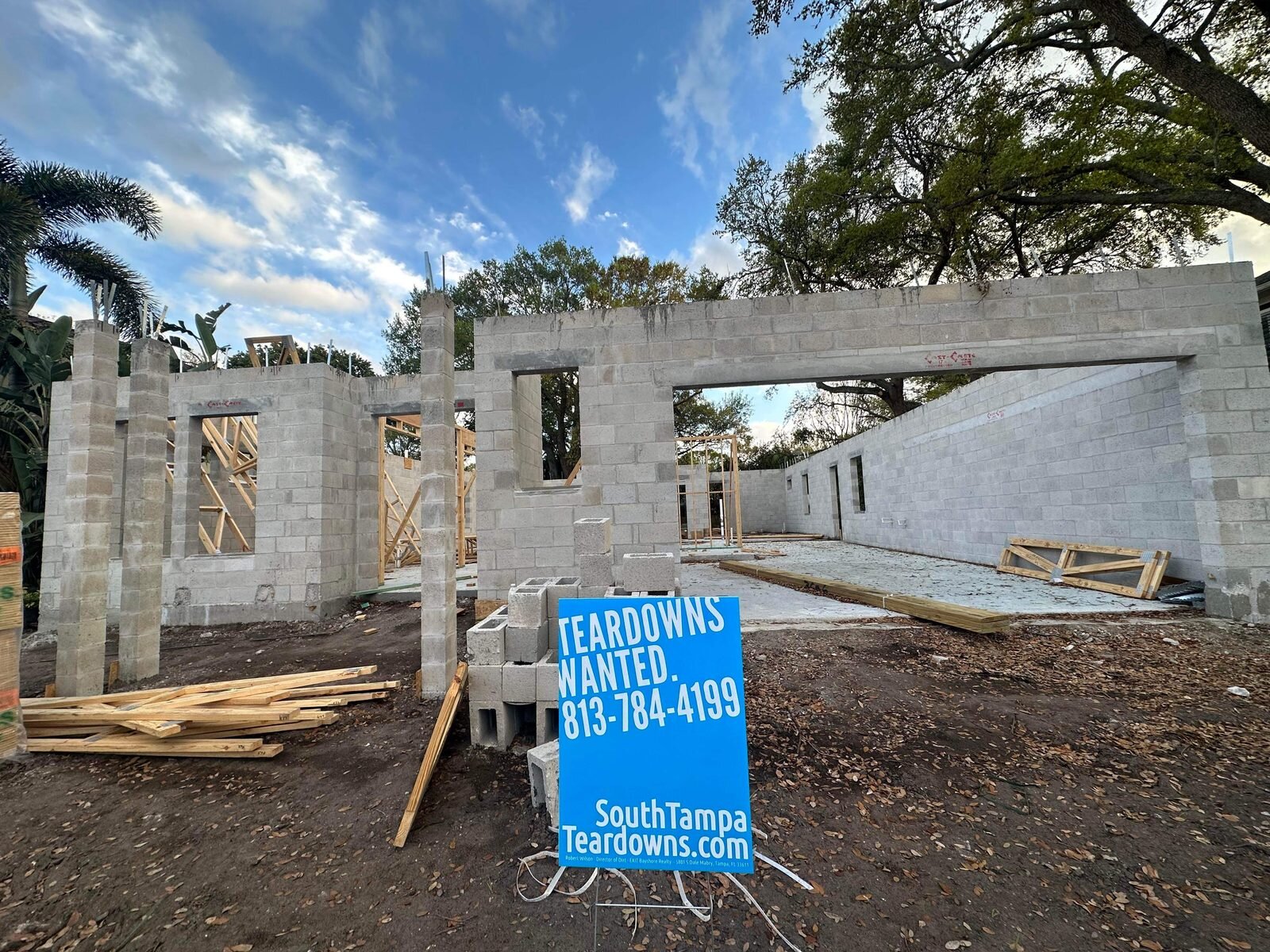 Block walls going up on a new South Tampa house with a Teardowns Wanted sign