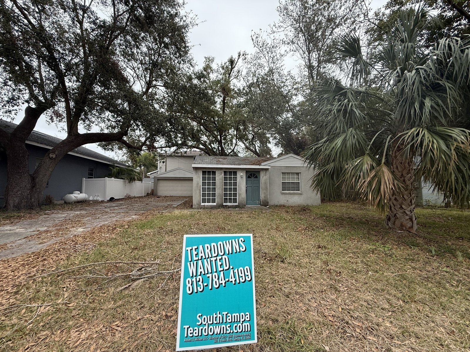 Older South Tampa house with a Teardowns Wanted sign