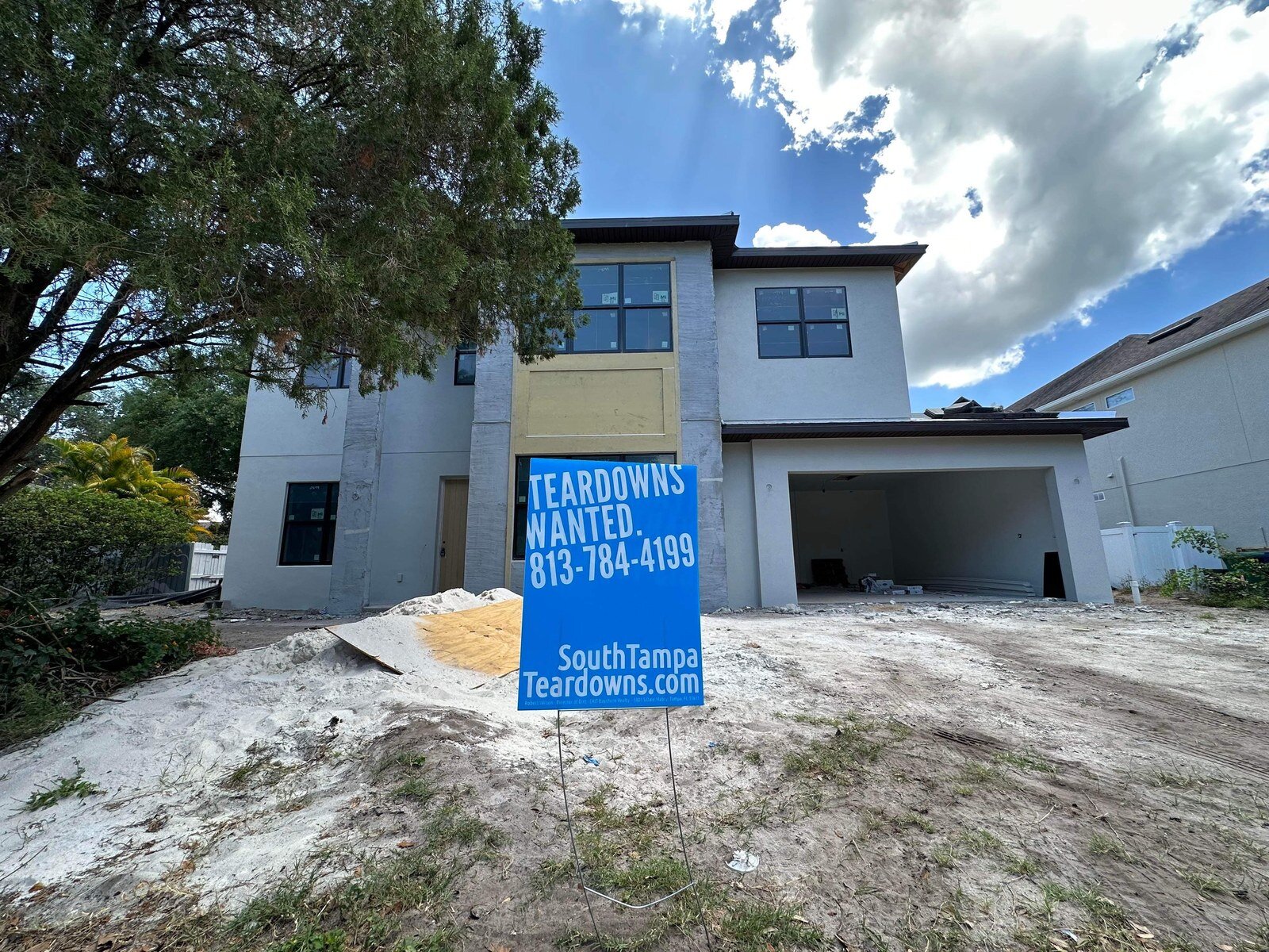 New South Tampa home under construction with a Teardowns Wanted sign