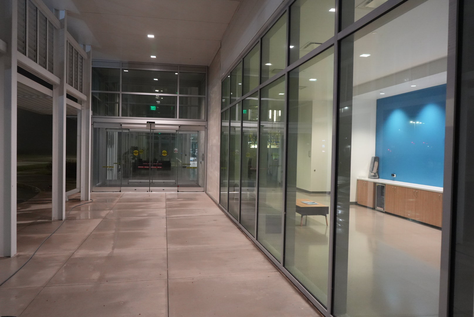 Commercial building entrance after pressure washing in The Woodlands, TX