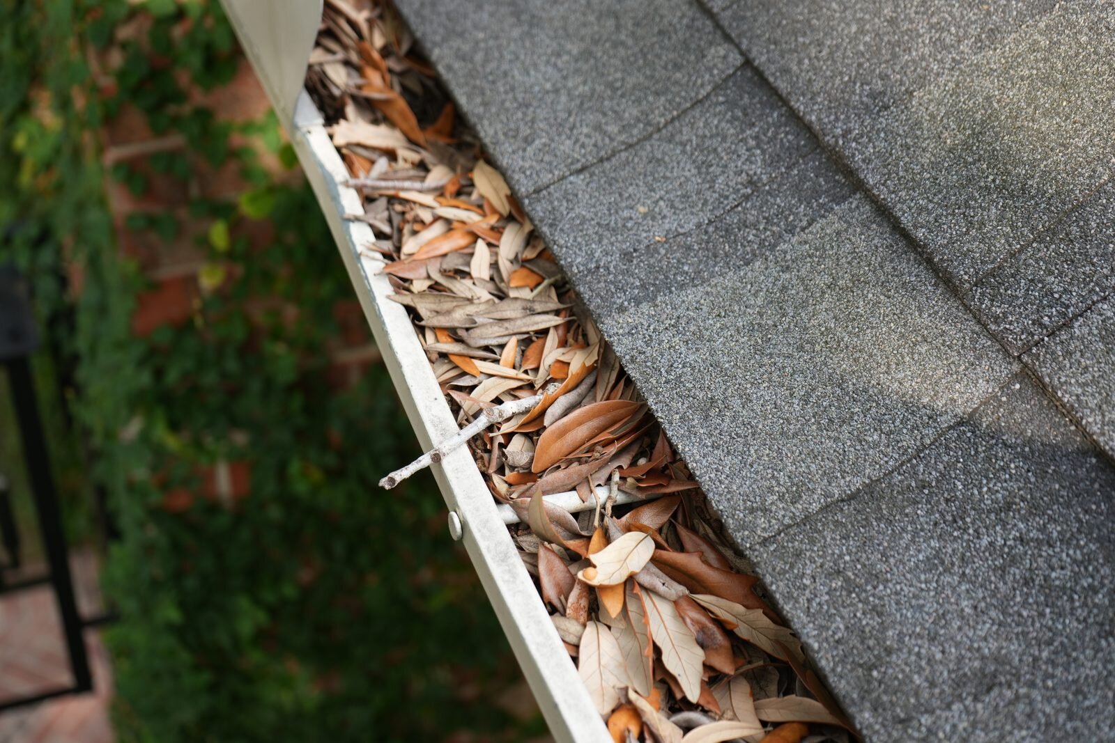 Roof and gutter cleaning on a residential home in The Woodlands, TX
