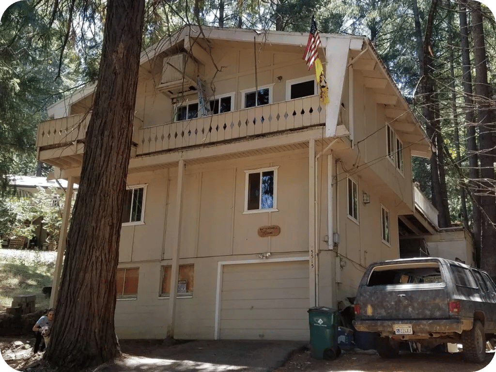 Old distressed home in Los Angeles with visible damage and repair needs