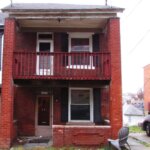 Old Pittsburgh brick row house bought as-is for cash by We Buy Property