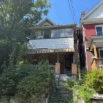 Pittsburgh house with overgrown yard sold as-is for cash