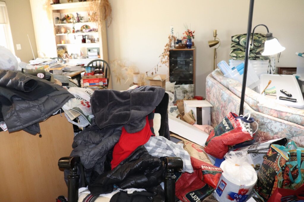 Selling a hoarder house in Rio Grande Valley, TX with cluttered rooms and belongings inside the property