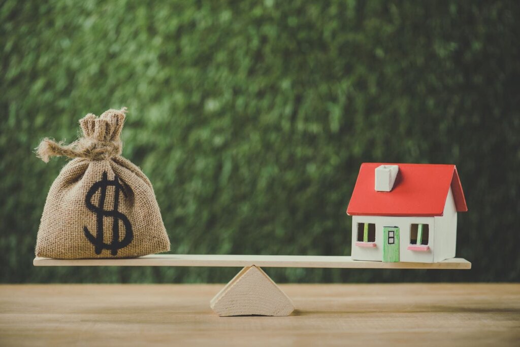 Homeowner calculating property holding costs for a house in McAllen, Texas