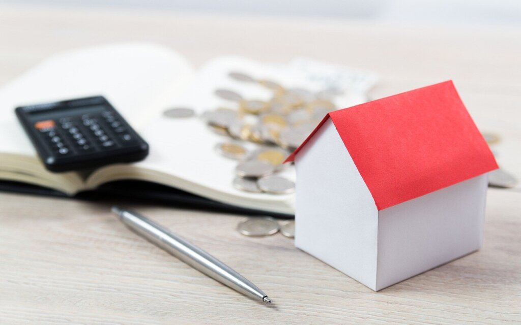 Homeowner reviewing the costs of selling a house with a realtor in San Juan TX including commissions, repairs, and closing expenses