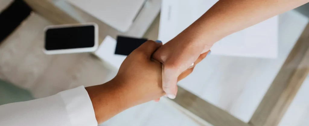 Picture of shaking hands with trusting people