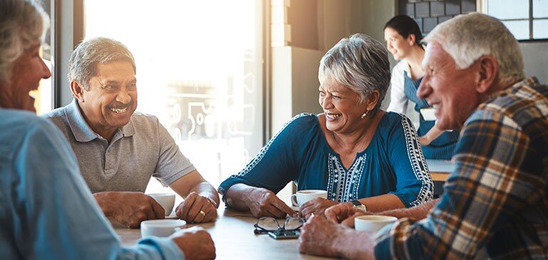 Happy Seniors Drinking Coffee in Long-Term Care