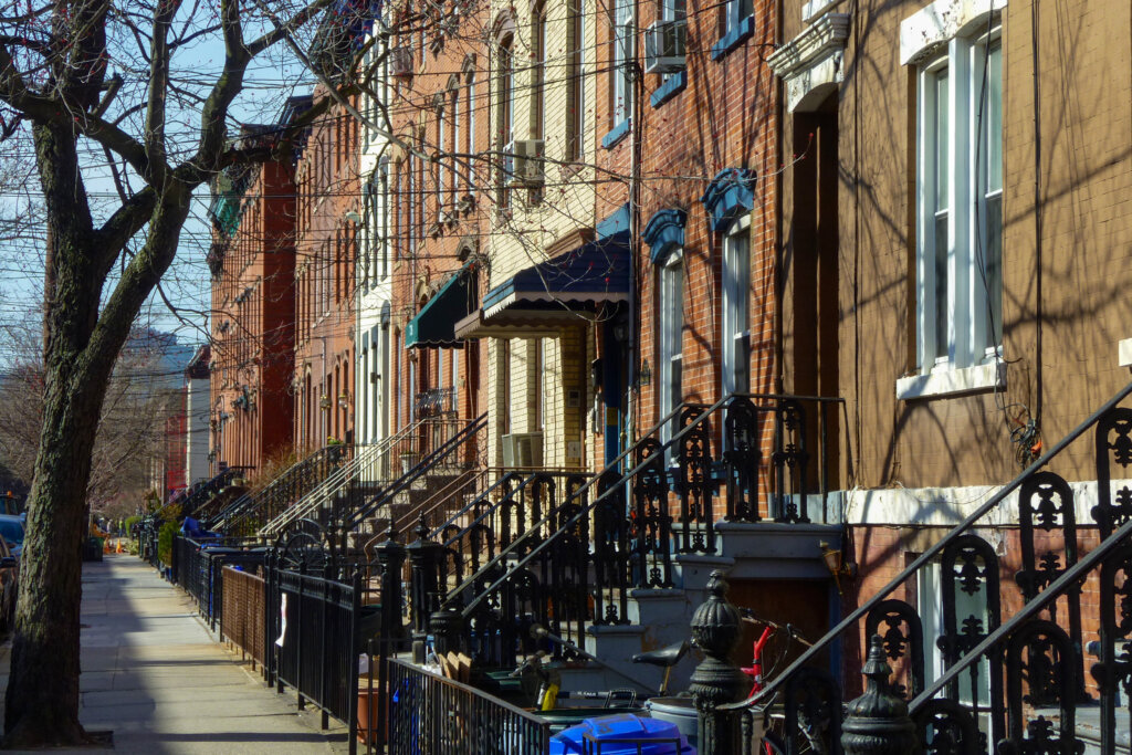 Row of houses and sidewalk in the city