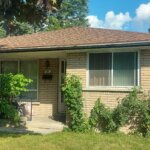 Brick house in Hamilton, Ontario, symbolizing a fast and transparent cash sale with flexible closing options and no hidden fees.