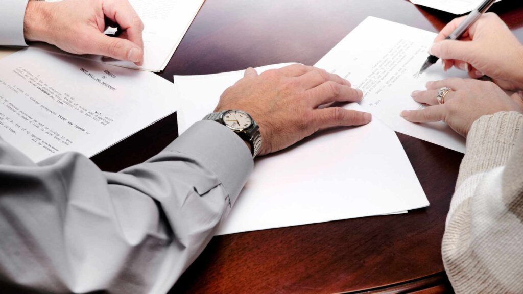 Person signing paperwork to become the executor of an estate
