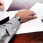 Person signing paperwork to become the executor of an estate