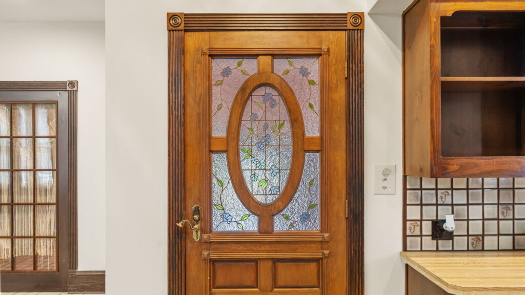 Carved wooden door in house in Rome, GA.