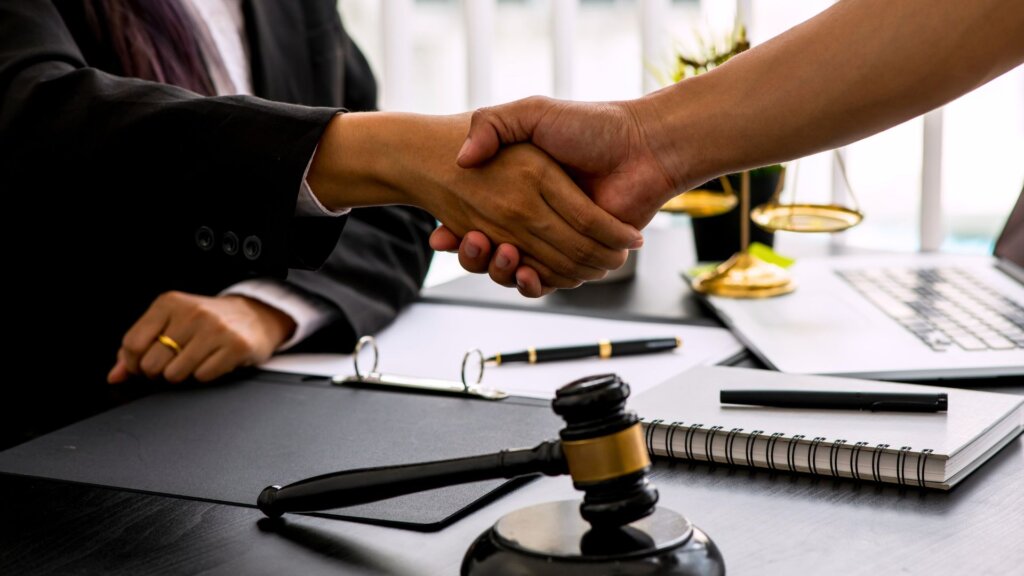 Person consulting with their lawyer in Rome, GA.