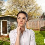 woman at home in sugar land tx in back yard pondering the foreclosure process and home selling options