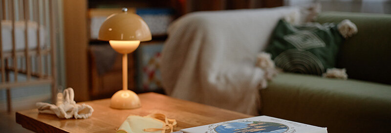 cozy lived in home with wooden table and lamp