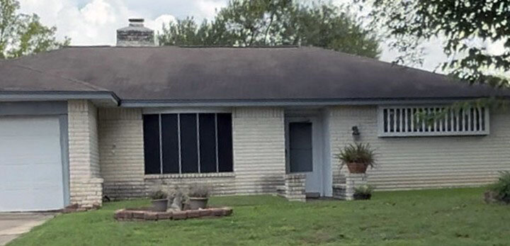 A well-maintained brick ranch home in a southwest Houston neighborhood, typical of the well-loved homes Grandma House Buyer works with