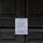 entry notice on wooden exterior door of houston rental property