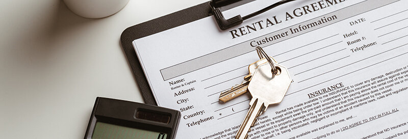 houston lease agreement with keys calculator and coffee