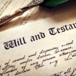 a last will and testament document with old fashioned pen