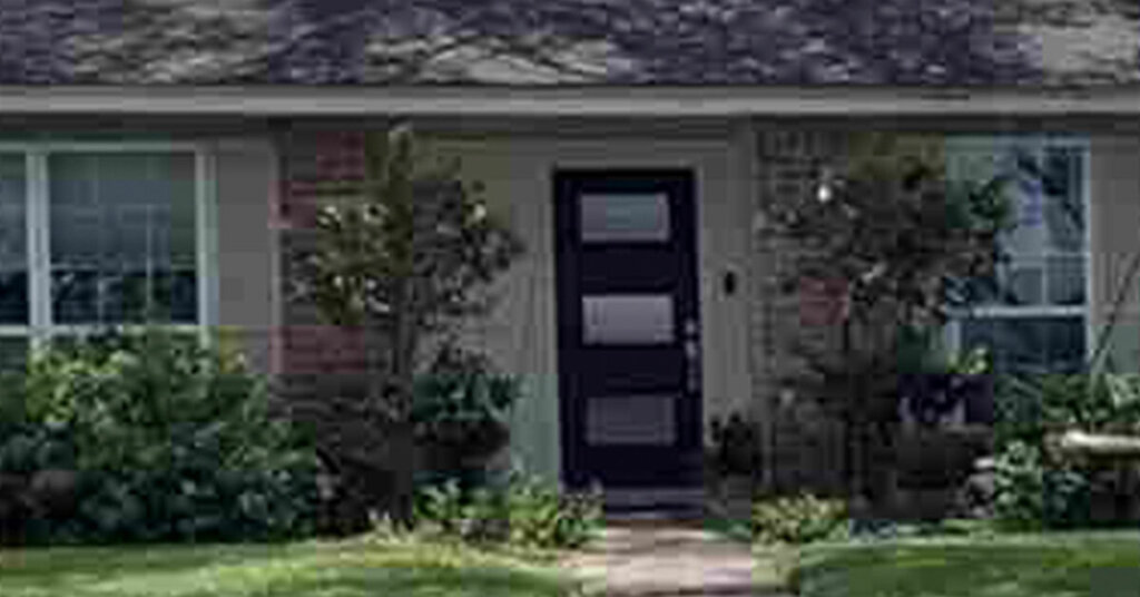 Red Brick Suburban Ranch House in Manvel TX with shady well kept front yard with blooming shrubs