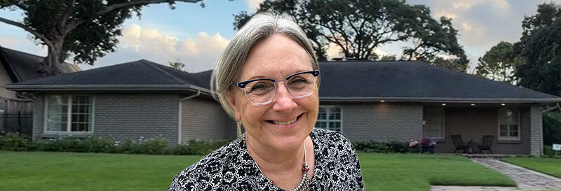 becky fields the grandma house buyer in front of a Belleville TX ranch house
