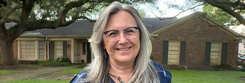 becky fields the grandma house buyer in front of a Conroe TX ranch house