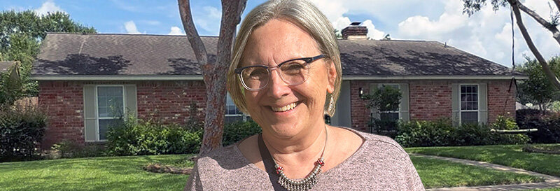 becky fields the grandma house buyer in front of a Cypress TX ranch house