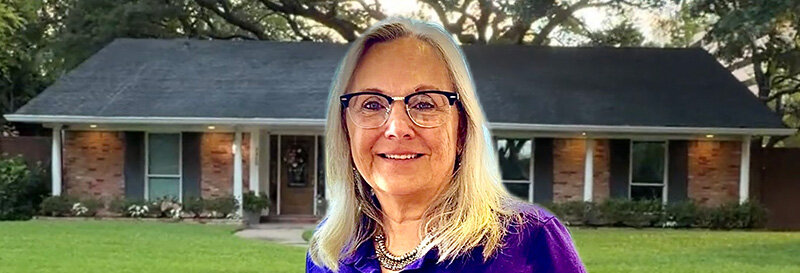 becky fields the grandma house buyer in front of a Dayton TX ranch house