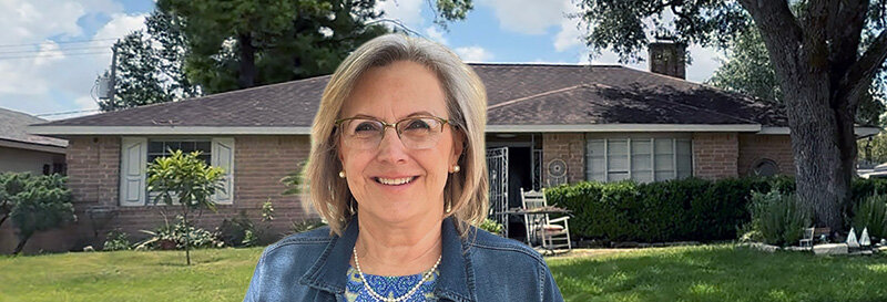 becky fields the grandma house buyer in front of a Rosenberg TX ranch house