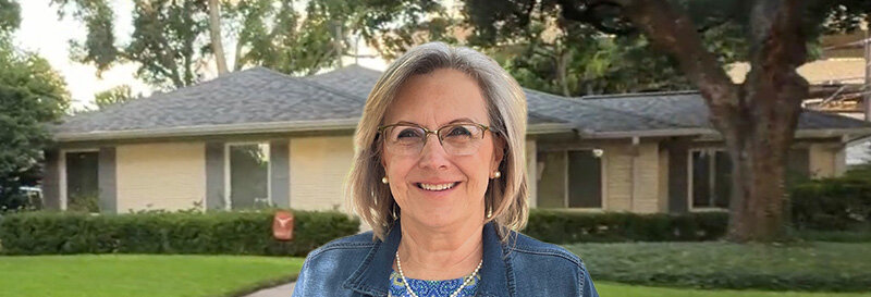 becky fields the grandma house buyer in front of an Angleton TX ranch house