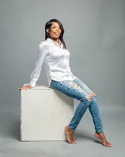 Jessica, founder of Legacy Properties Texas, a Black woman-owned real estate business in Dallas, TX.