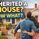 Couple standing outside inherited house with moving boxes while deciding what to do with inherited property in Northern Virginia